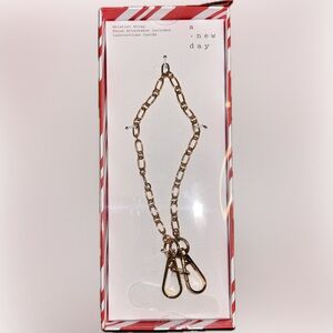 A New Day Gold Cell Phone Wristlet Chain